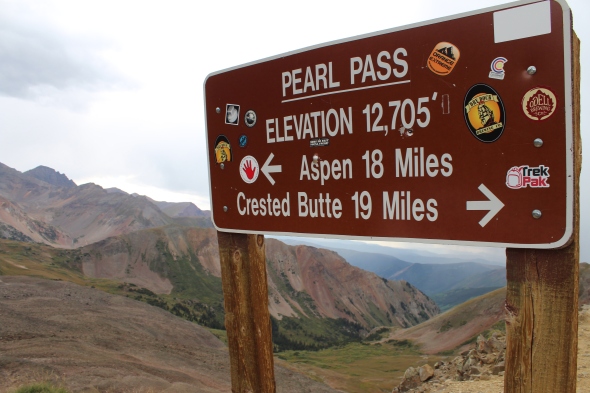 We made it to the peak of Pearl Pass (nevermind the lightning and everything literally buzzing. . .)-- the map said the road was 6 miles long, not 19 MORE miles to Crested Butte! 