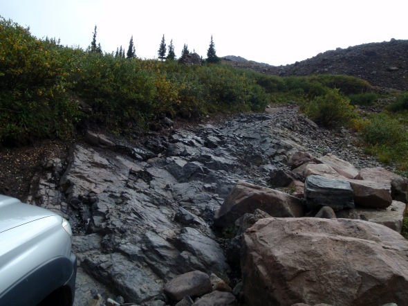 One of the "dicey" spots on Pearl Pass Road. . . we should have thought twice before taking Dondi's stock 4WD truck up an old US Forest Service Road 